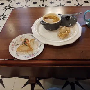 Curry chicken soup, curry empanada and a street corn empanadas and a chocolate bomb  Delicious