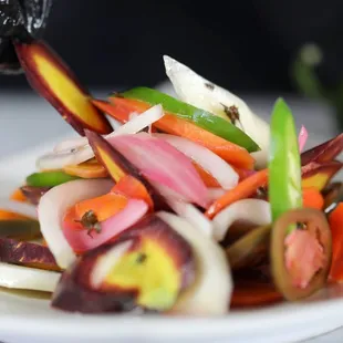 Made with farm fresh heirloom carrots, a tangy marinade and a host of traditional flavors, our Rainbow Escabeche is absolutely fantastic.