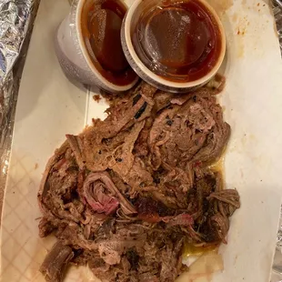 Shredded beef brisket and BBQ sauce.