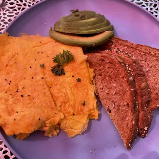 The TOURIST breakfast. Unripe avocado. It was so hard I couldn't eat it. Eggs were just a hard brick of scrambled eggs. YUCK