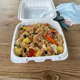 Pineapple fried rice w/ veggies instead of chicken. Cashews and raisins are in there too. Delicious!