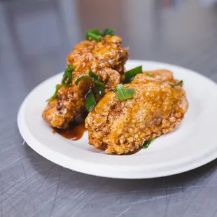 a plate of fried food on a table