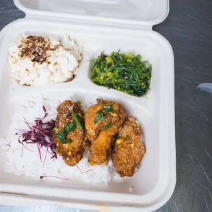 a meal in a styrofoam container