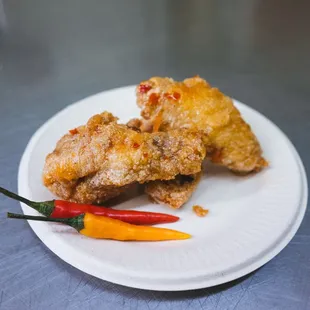 a plate of fried food on a table