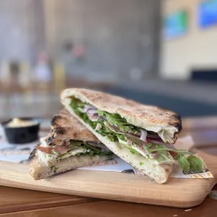 a sandwich on a cutting board