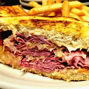 a corned beef sandwich and french fries
