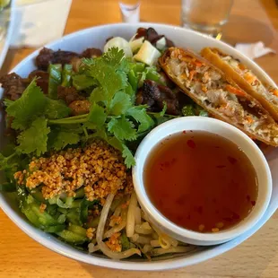 Pork and egg roll noodle bowl