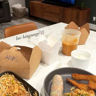 pad thai, red curry, spring rolls and chicken satays