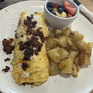 South of The Border Omelet 3 Eggs, Chorizo, Pico de Gallo, Salsa Roja, Mozzarella Cheese, Hash Browns or Home Fries &amp; One Side