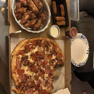 Parmesan wings, mozzarella sticks, meat lovers pizza