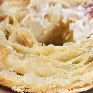 Cross section of a strawberry &amp; cream croissant