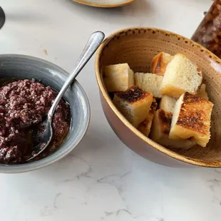 Toasted bread cubes with Tapenade