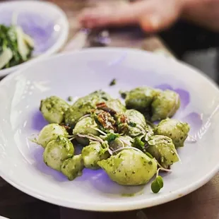 Pesto Gnocchi, so puffy and delicious! This is half portion, they split the plate for us. :)