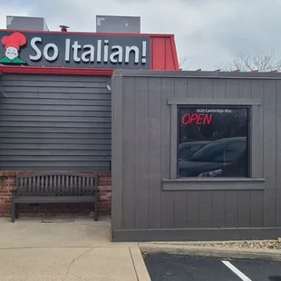 Exterior view of the restaurant with a great enclosed patio area to the left.