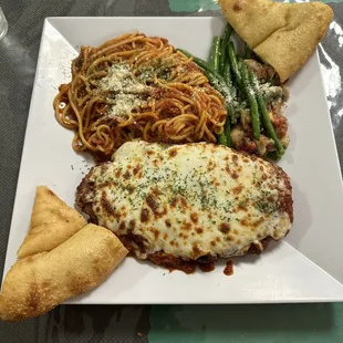 Chicken Parmesan with Spaghetti, and Focaccia bread.