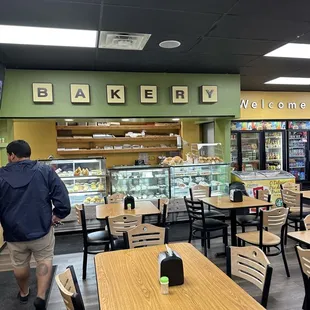 a man walking through the store