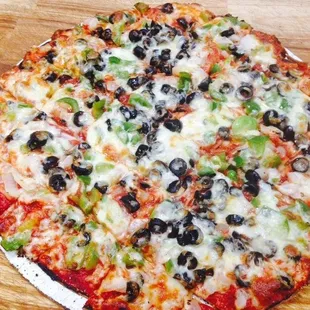 a pizza on a wooden table