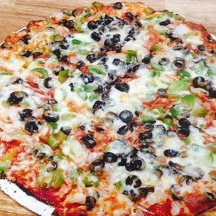 a pizza on a wooden table