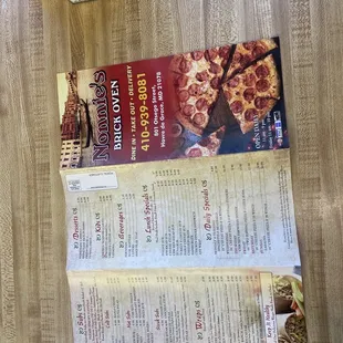 a pizza menu on a table