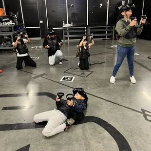 get down low:  it's an expert-level evasive maneuver when a flying robot head is attacking you...  the unreal feels all too real in VR :-)