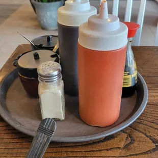 Condiments: Sriracha Hot Sauce....Hoisin Sauce....Hot Chili Sauce....Pickled Jalapeños....Soy Sauce....Salt and Pepper....Yum....