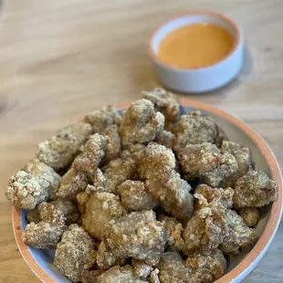 a bowl of fried chicken nuggies