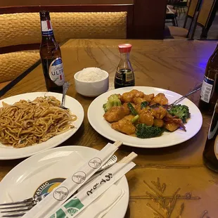 Orange chicken  with steamed rice  And a order of chicken chow main