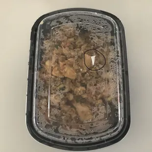 a plastic container filled with food