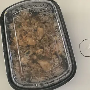 a plastic container filled with food