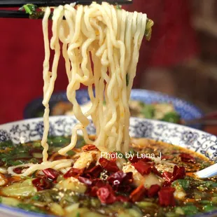 Pickled Cabbage and Fish Filet Noodle Soup 酸菜鱼汤面 ($14.99) - with wide noodles