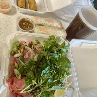With tax. $22. Large beef pho two spring rolls two fried rolls. Sauce is perfect. Tons of meat. Tons of sprouts and herbs. Amazing.