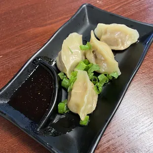 Potstickers combo-ed with noodles.