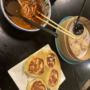 Tried the spicy beef soup, 6 Piece Soup Dumpling and crispy Beef Scallion Bao.