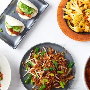 pork belly bao, dry pot cauliflower, string beans, pan fried noodles, poached beef in chili sauce