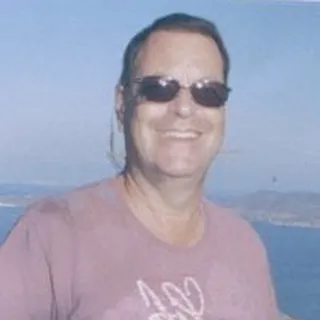 Dennis E.