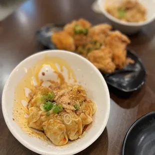 Pork wonton with chili oil and chicken wings