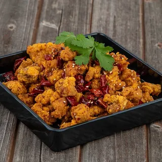 S12. Dry Fried Spicy Chicken Popcorn