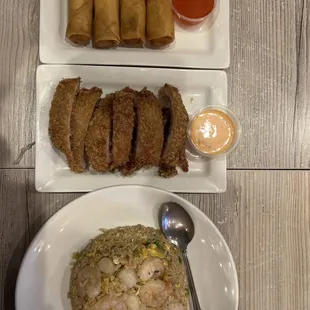 House fried rice, fried pork chop, and veggie spring rolls ... food is delicious and smells so good