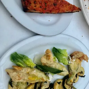 Garlic bread with Calabrian chili oil, squash blossoms. Delicious!