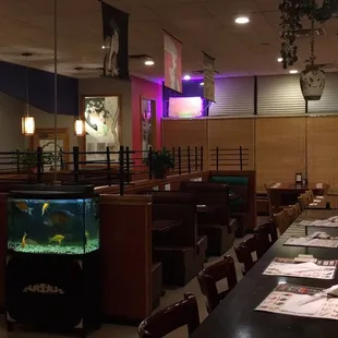 a restaurant with a fish tank