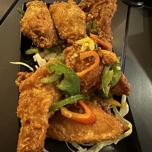 Salt and Pepper Fried Wings, wings were so delicious and crispy, peppers on top could use some more flavor, they were just bell peppers.
