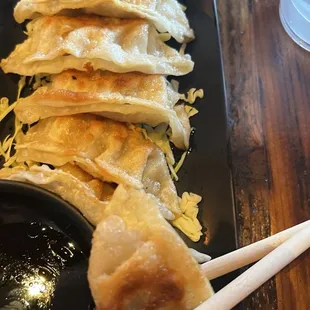 Pan Fried Dumplings (6) / crispy outside tender inside and great dipping sauce