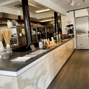 a view of a restaurant counter