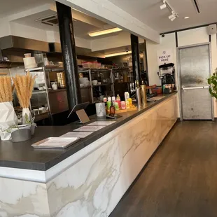 a view of a restaurant counter