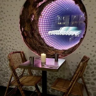 a table and chairs in a restaurant