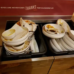 This is disgusting - in the dining room. They aren't even busy.  If I saw this before I ordered I would have left. Piles of dirty dishes.