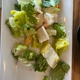 caesar salad with wilted brown lettuce.