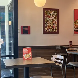 a table and chairs in a restaurant