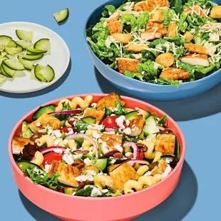 two bowls of salads