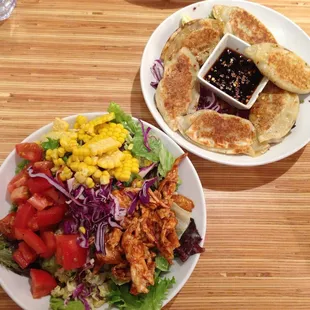 Salad and potstickers
